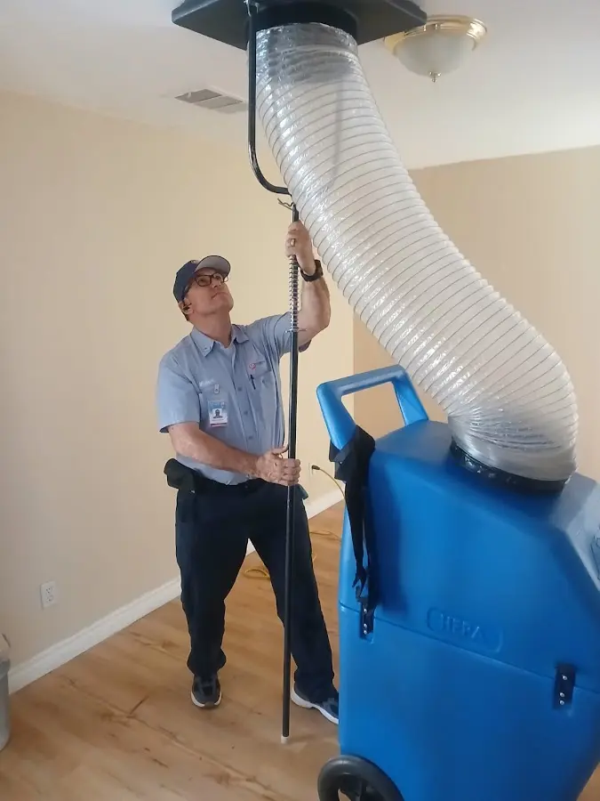Furnace Tune-Up technician using HEPA equipment in Scotch Plains